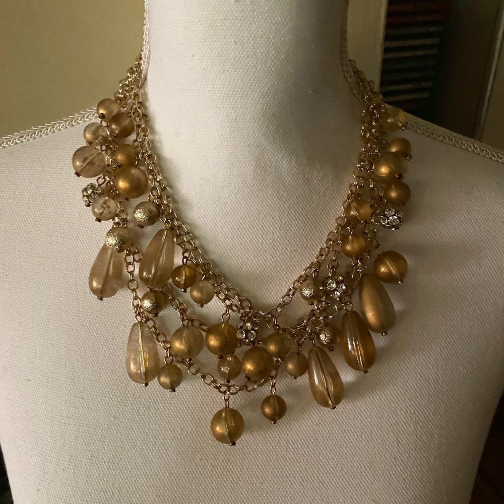 GOLD TONE BEAD AND CRYSTAL FOUR STRAND NECKLACE